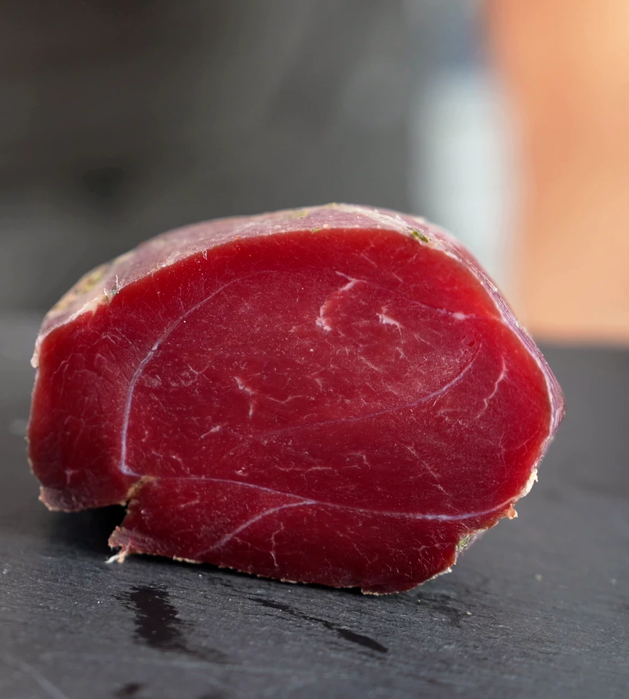 Wild boar ham, cut open