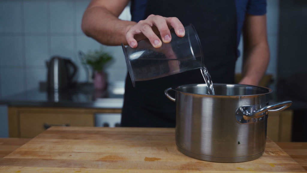 Bringing the spiced liquid to a boil