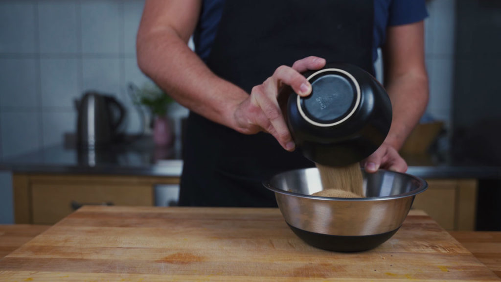 Mixing raw cane sugar into mustard flour