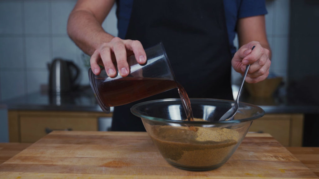 Adding the infusion and vinegar to the mustard mixture