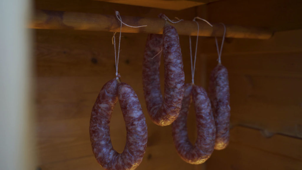 Cold smoking Bregenwurst in the smoker