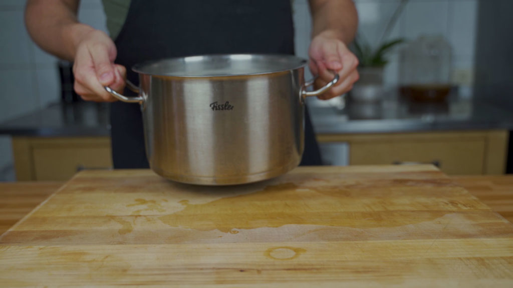 Gently cooking corned beef at 91 °C (196 °F)