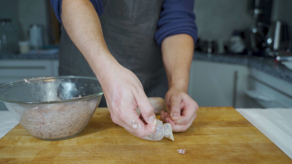 Tying the end of the cotechino
