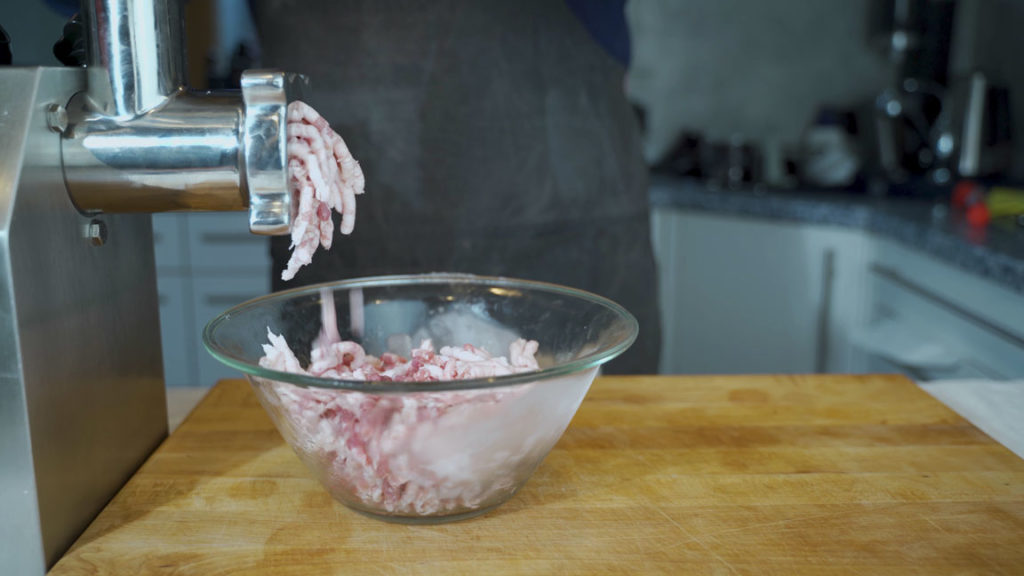 Grinding the meat and skin