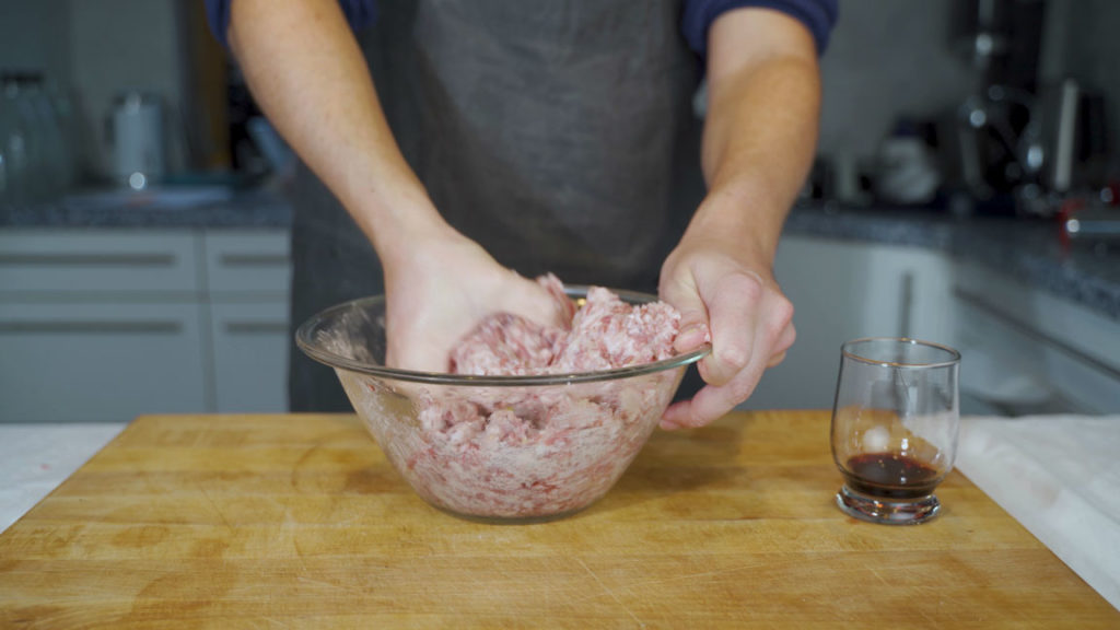 Adding seasonings to the ground meat