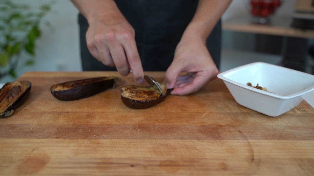 Separating eggplant flesh from the skin