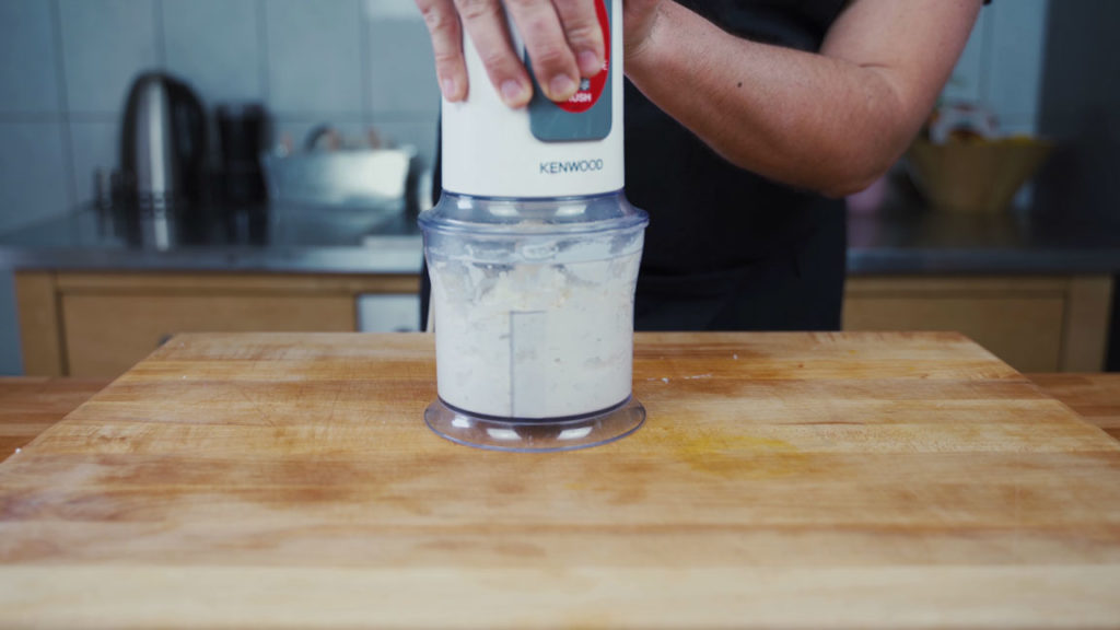 Blending feta spread until creamy