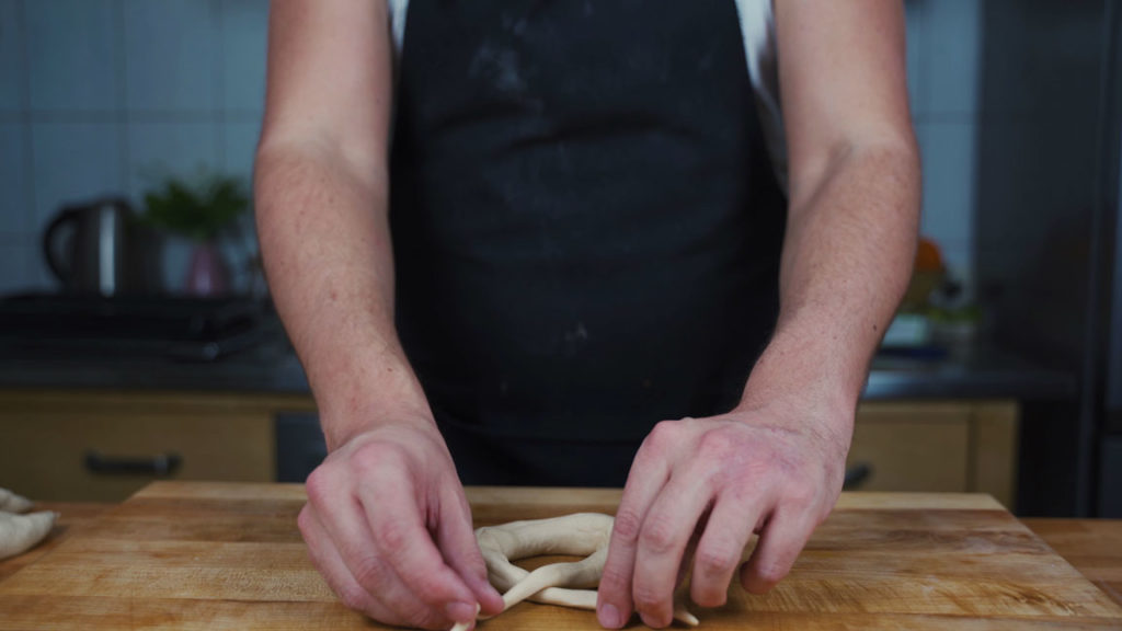 Laying the pretzel ends over each other