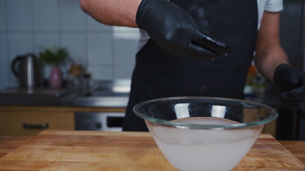 Mixing lye solution in a glass bowl
