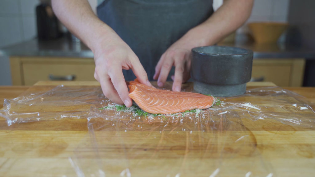 Salmon fillet on the curing mixture