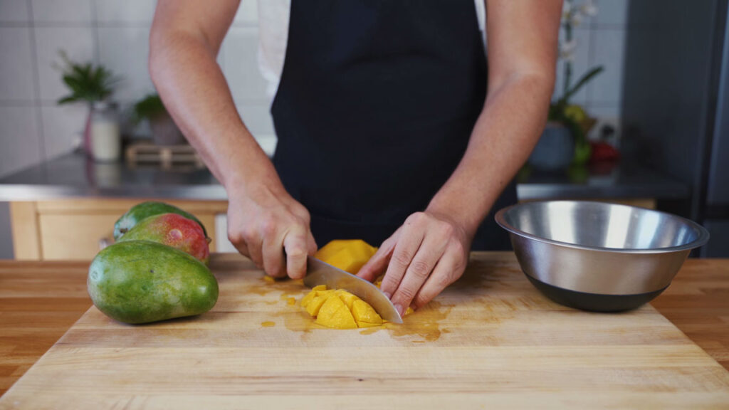 Cutting the mangoes