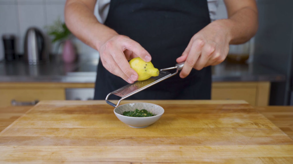 Grating lemon zest for mustard and dill spread