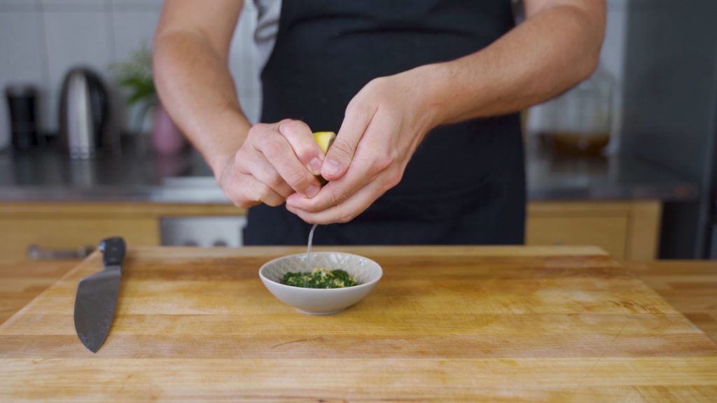 Squeezing lemon juice for the spread
