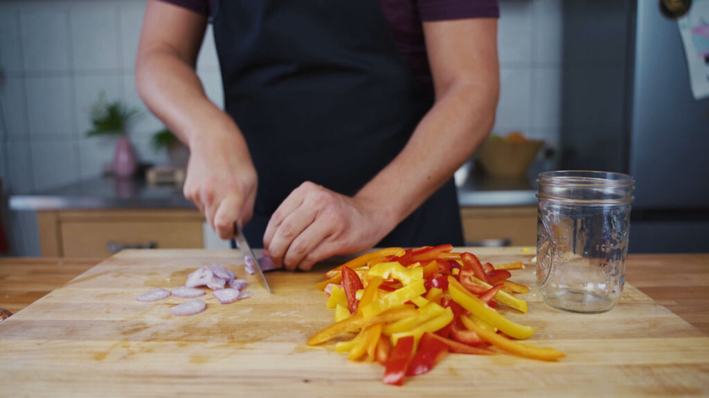 Slicing onions for pickled peppers