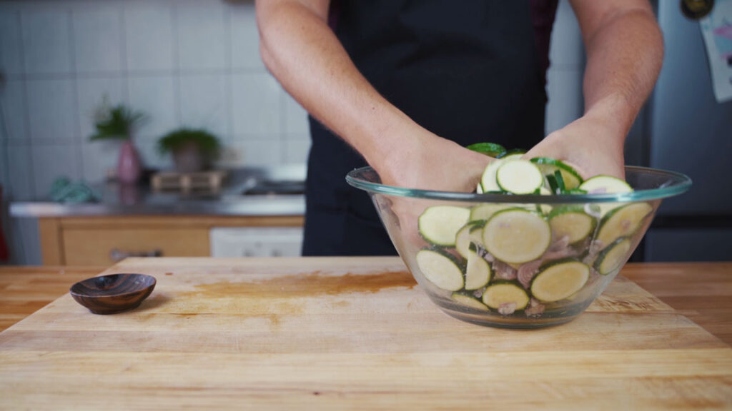 Mixing salt into the vegetables