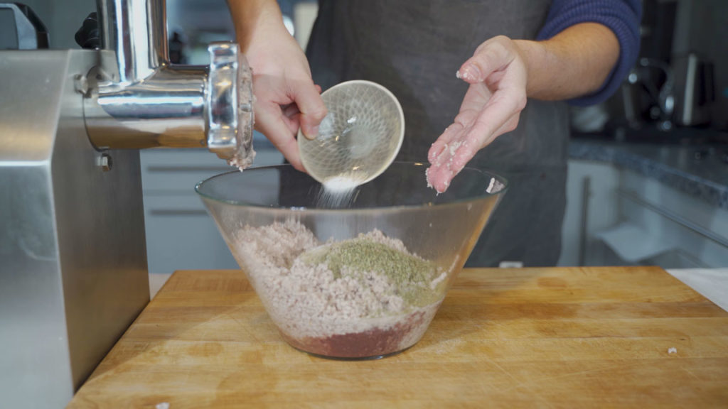 Adding seasonings to the liverwurst mixture