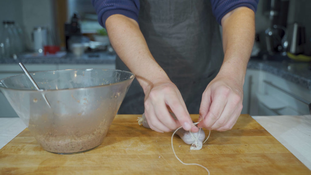 Tying the liverwurst casing ends