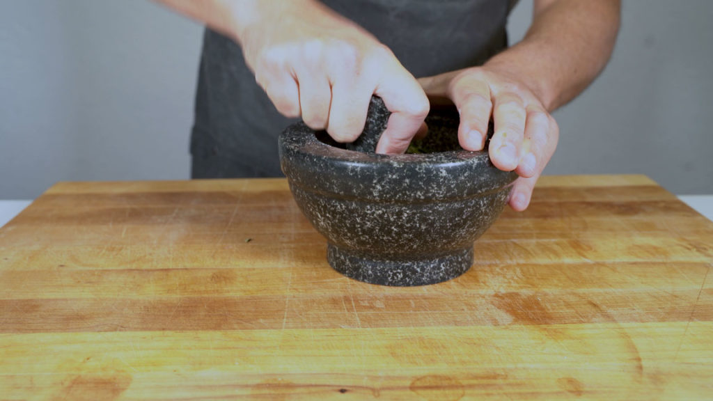 Spices for Tyrolean-style Speck in a mortar