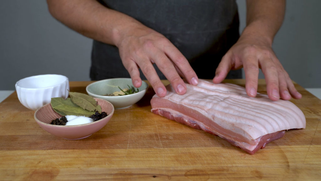 Weighing pork belly to calculate the seasonings