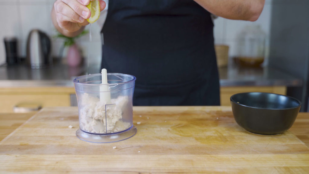 Crumbling tofu into the blender