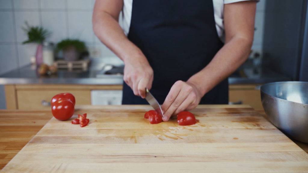 Dicing the tomato chutney ingredients